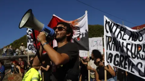 France-Wide Strikes Erupt In Response to Fiscal Cuts